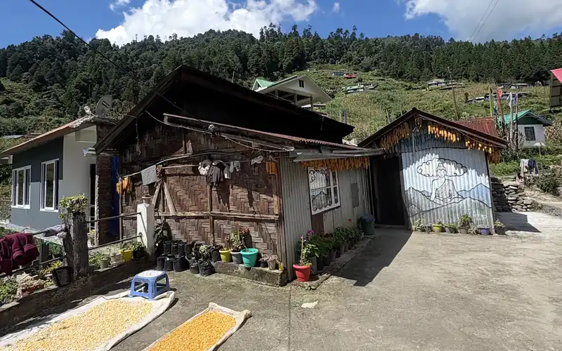 Eden Homestay, a family house in Gorkhey, with grain drying in the courtyard
